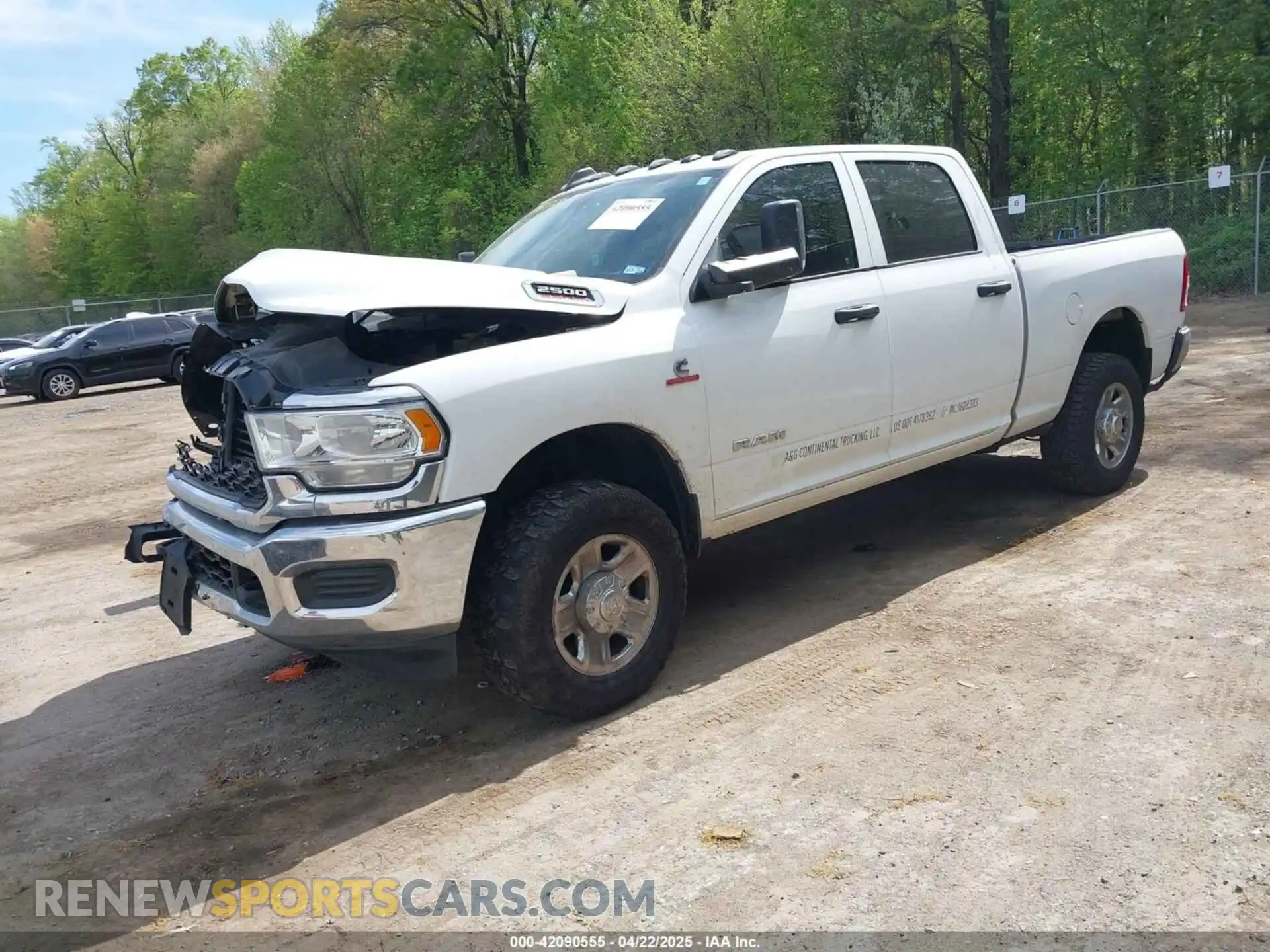 2 Photograph of a damaged car 3C6UR5CLXMG511265 RAM 2500 2021