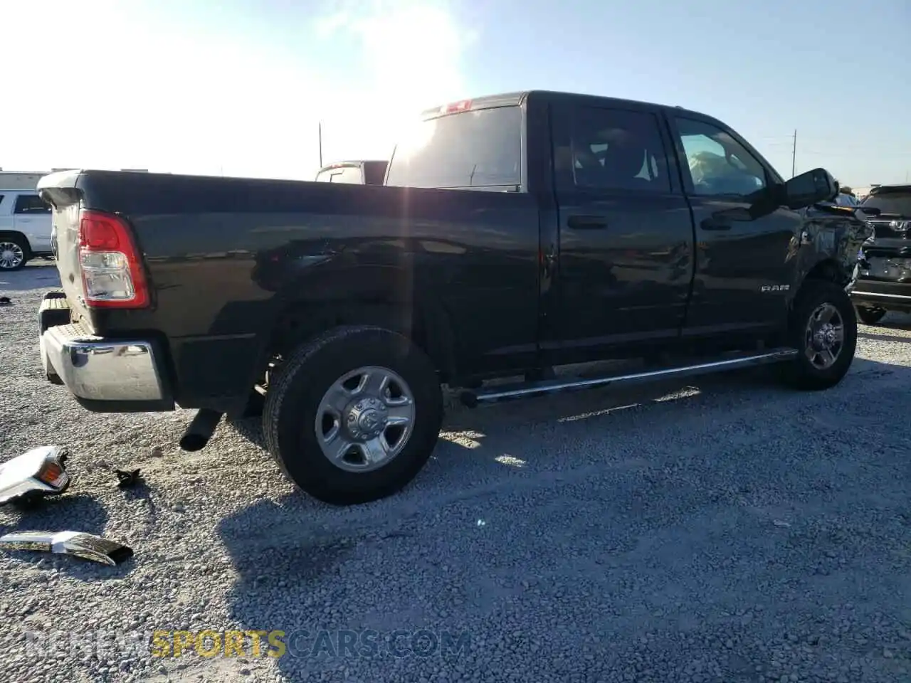 3 Photograph of a damaged car 3C6UR5CLXMG694652 RAM 2500 2021