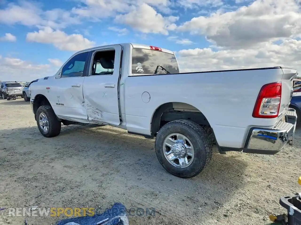 2 Photograph of a damaged car 3C6UR5DJ1MG555099 RAM 2500 2021