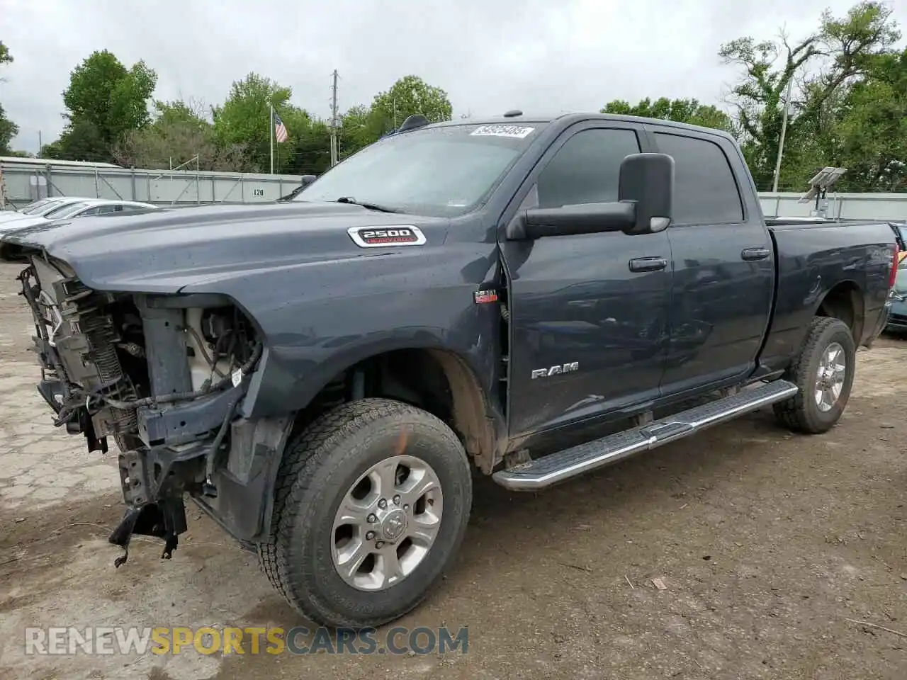 1 Photograph of a damaged car 3C6UR5DJ1MG625586 RAM 2500 2021