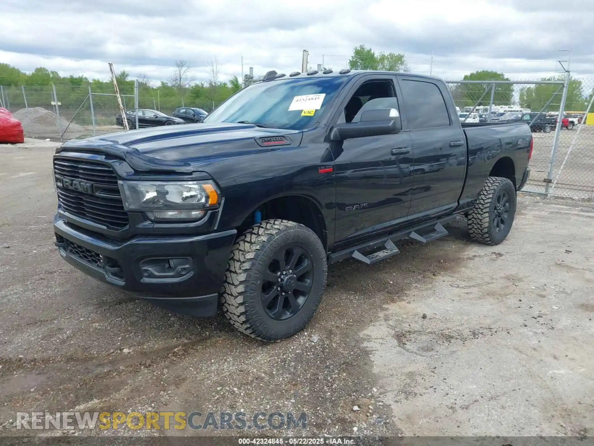 2 Photograph of a damaged car 3C6UR5DJ2MG532804 RAM 2500 2021