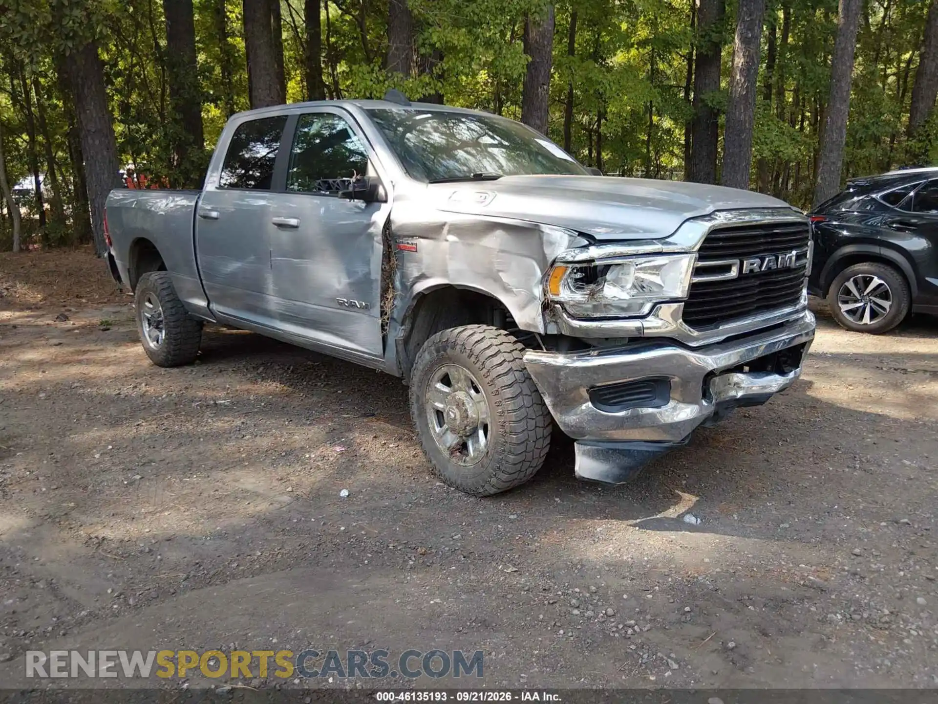 1 Photograph of a damaged car 3C6UR5DJ3MG628523 RAM 2500 2021