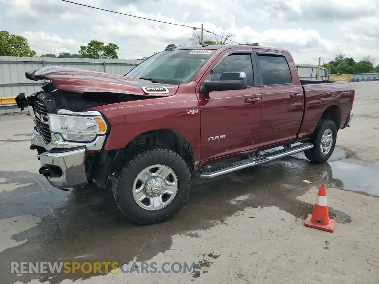 1 Photograph of a damaged car 3C6UR5DJ7MG556130 RAM 2500 2021