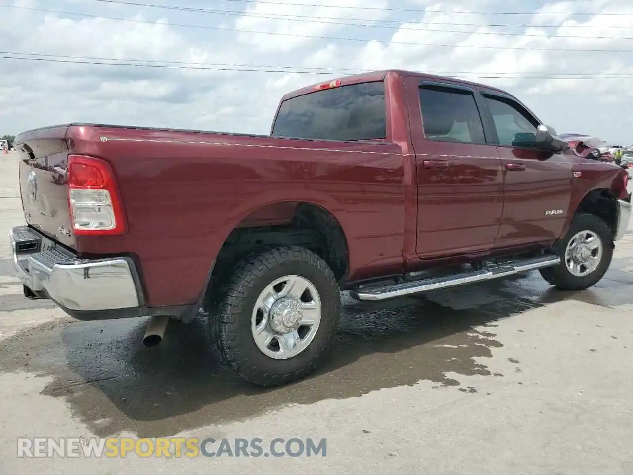 3 Photograph of a damaged car 3C6UR5DJ7MG556130 RAM 2500 2021