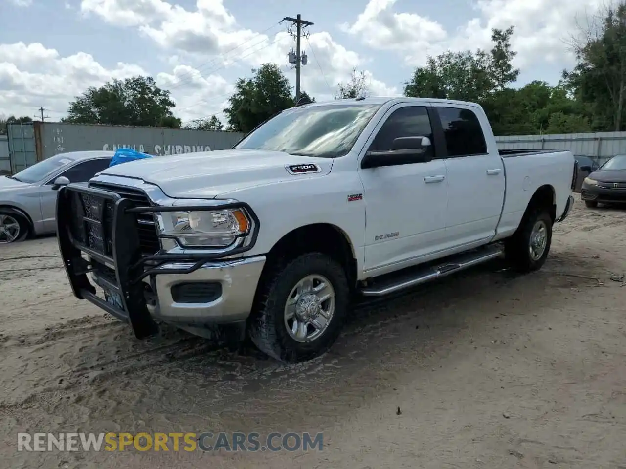 1 Photograph of a damaged car 3C6UR5DJ8MG554578 RAM 2500 2021