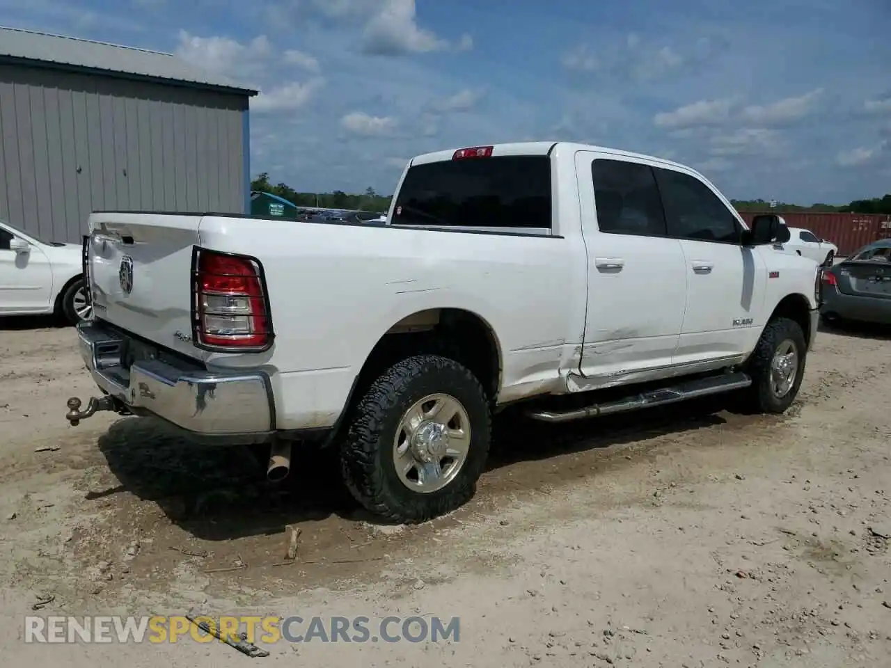 3 Photograph of a damaged car 3C6UR5DJ8MG554578 RAM 2500 2021