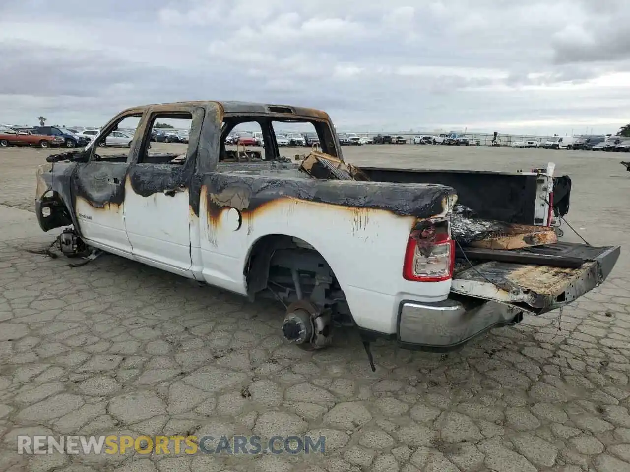 2 Photograph of a damaged car 3C6UR5DJ8MG594238 RAM 2500 2021