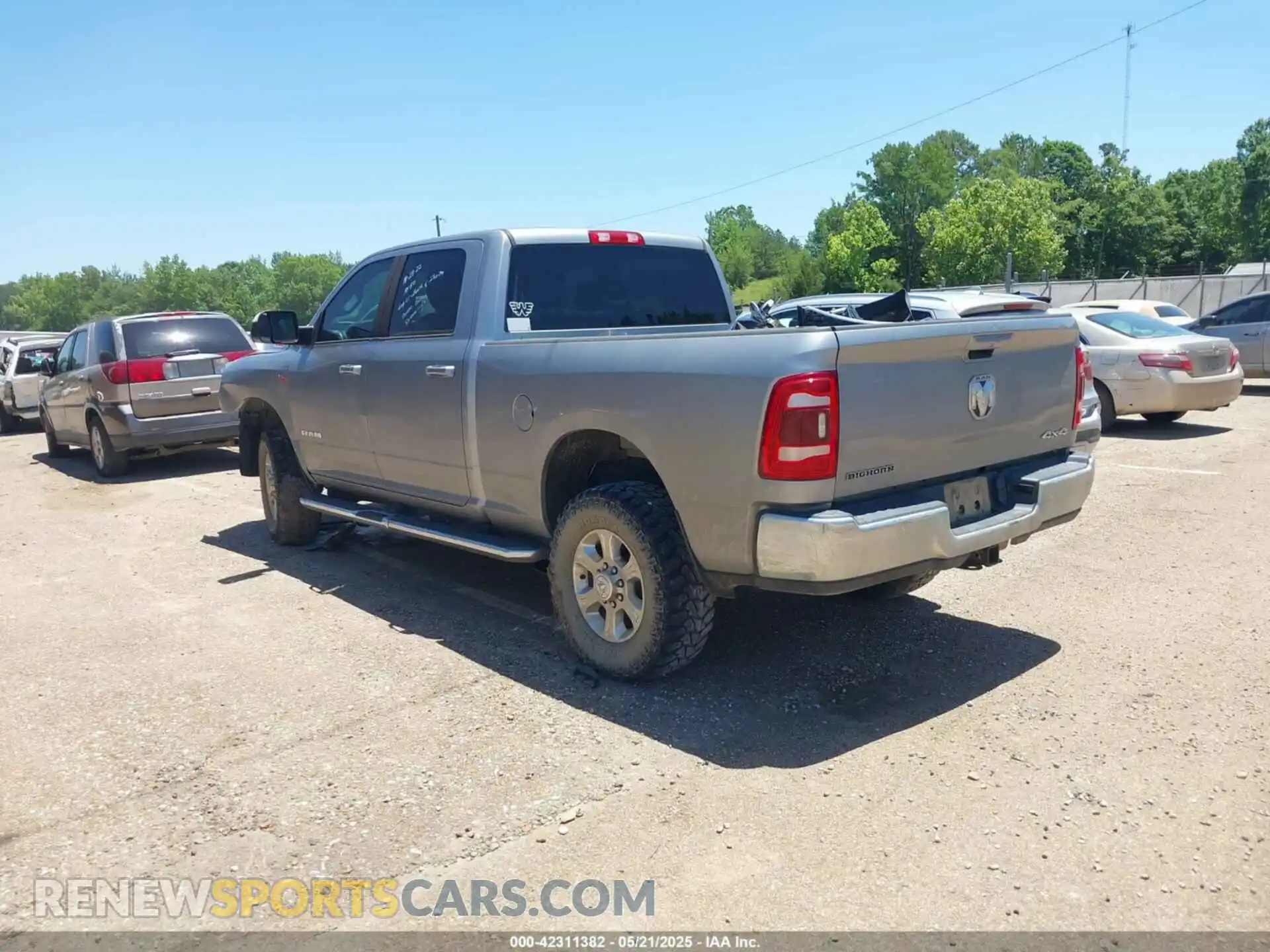 3 Photograph of a damaged car 3C6UR5DJ9MG590554 RAM 2500 2021