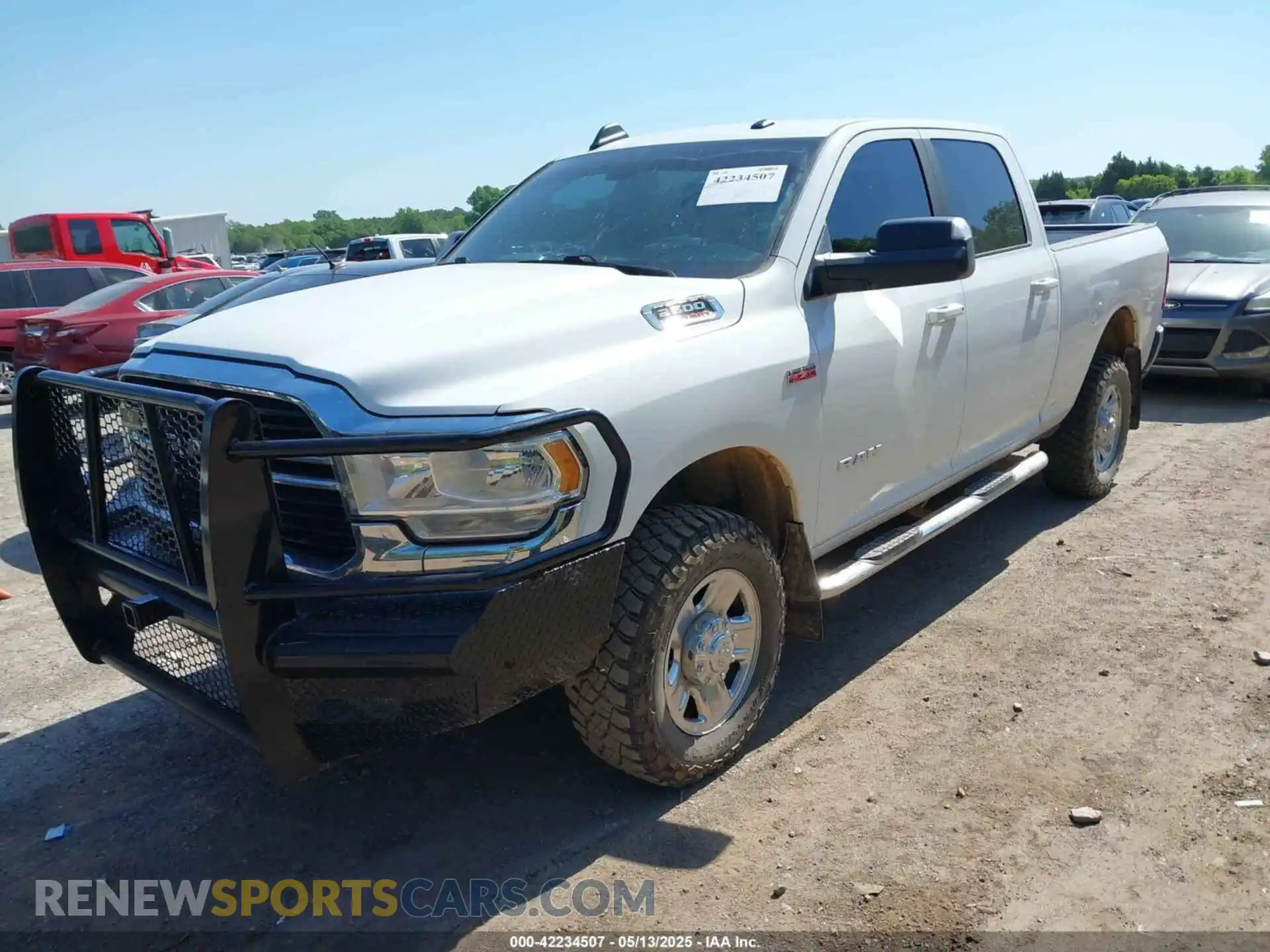 2 Photograph of a damaged car 3C6UR5DJ9MG656715 RAM 2500 2021