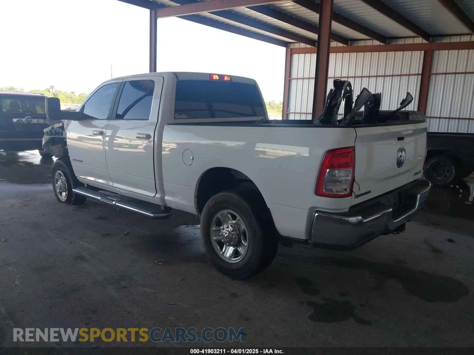 3 Photograph of a damaged car 3C6UR5DL0MG653459 RAM 2500 2021