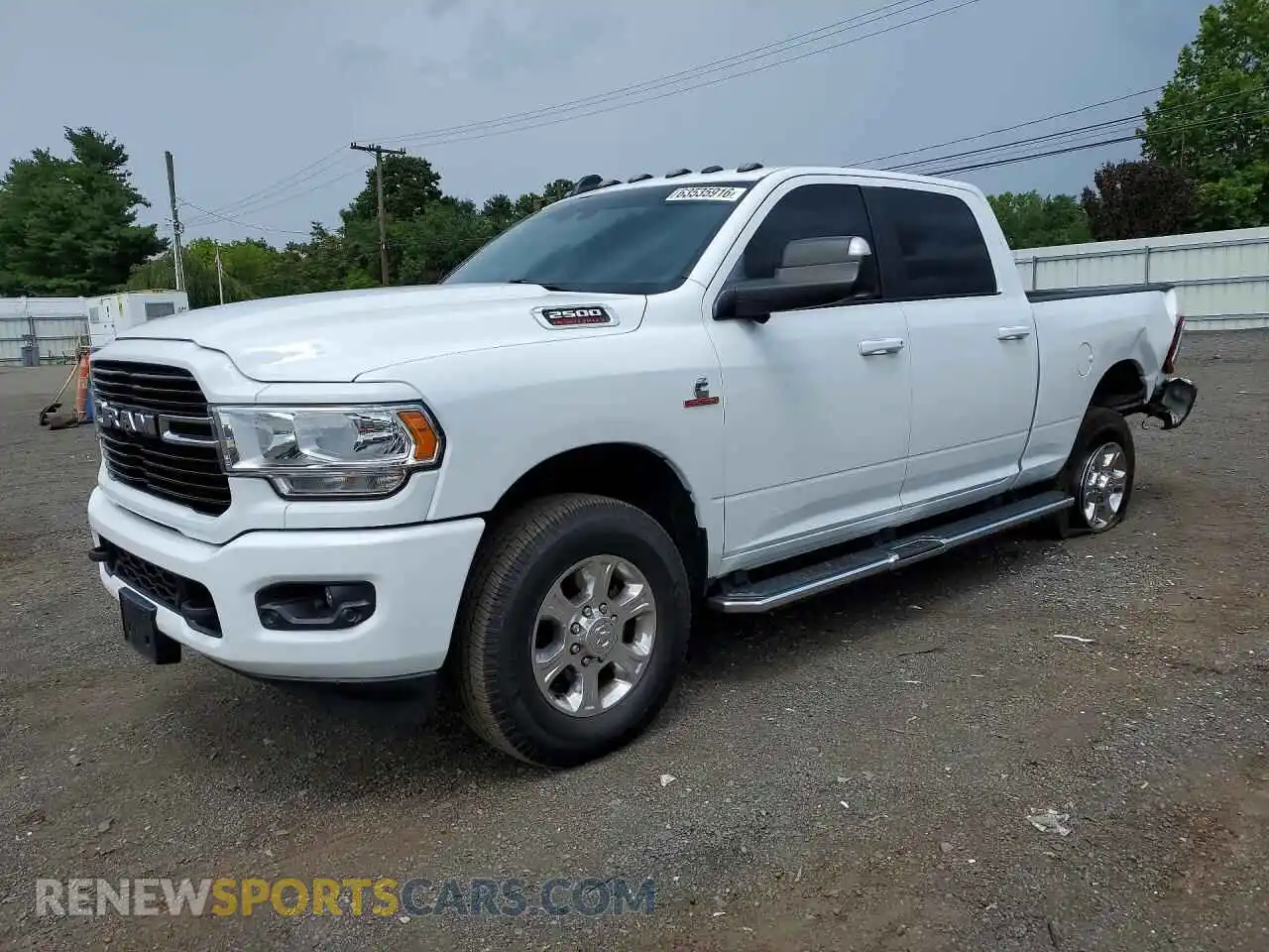 1 Photograph of a damaged car 3C6UR5DL1MG661263 RAM 2500 2021