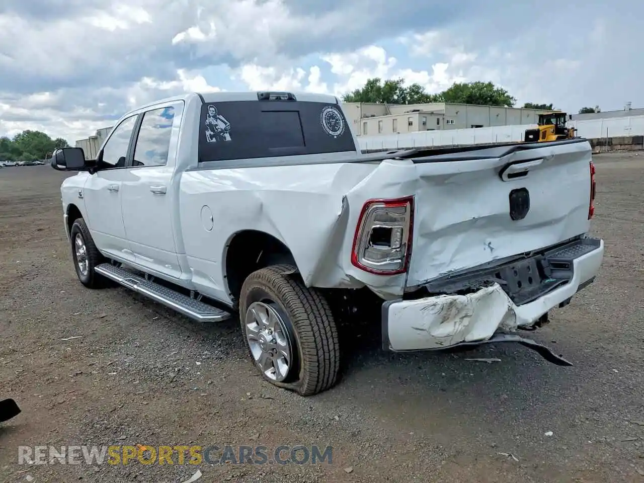 2 Photograph of a damaged car 3C6UR5DL1MG661263 RAM 2500 2021