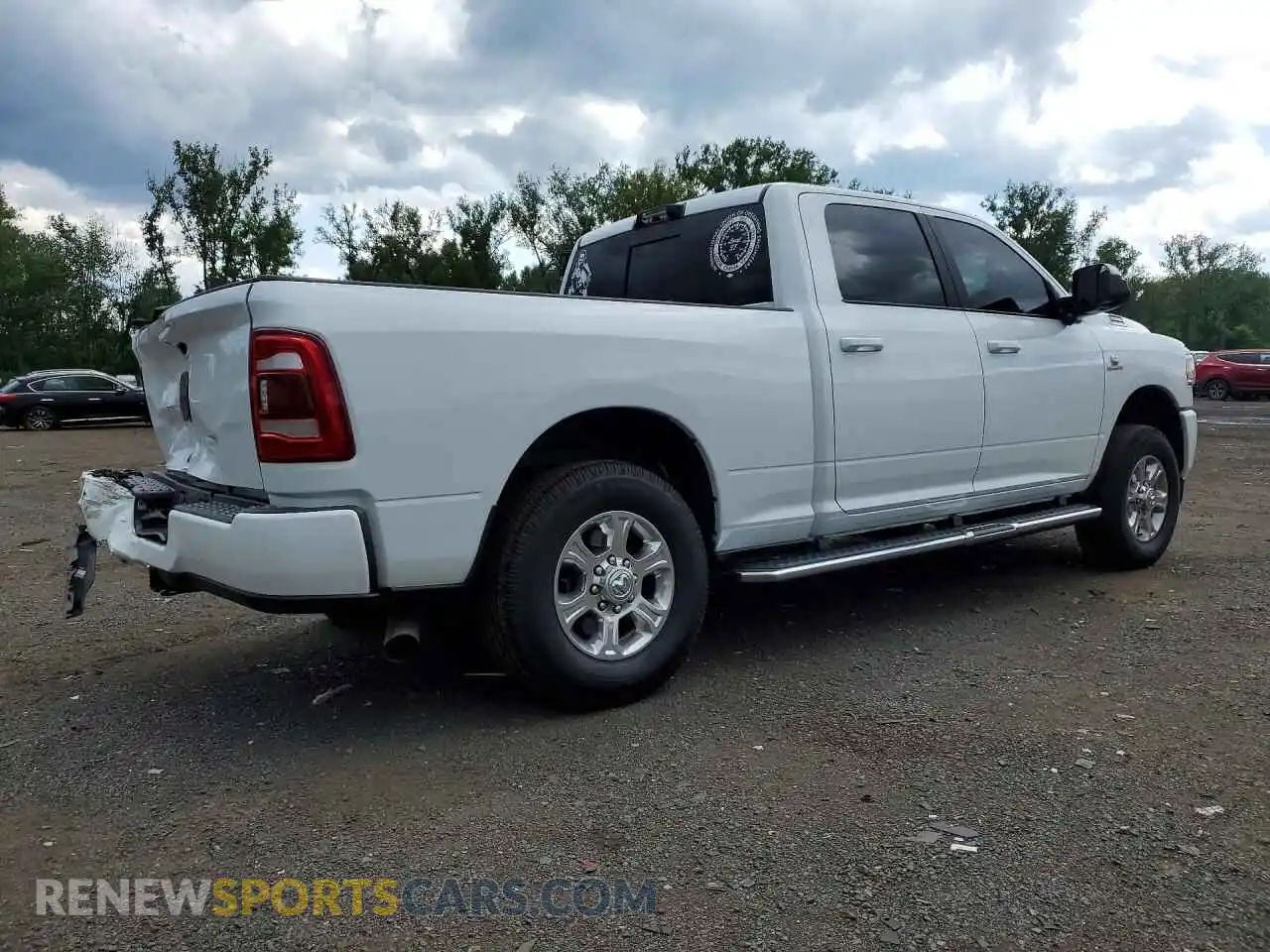 3 Photograph of a damaged car 3C6UR5DL1MG661263 RAM 2500 2021