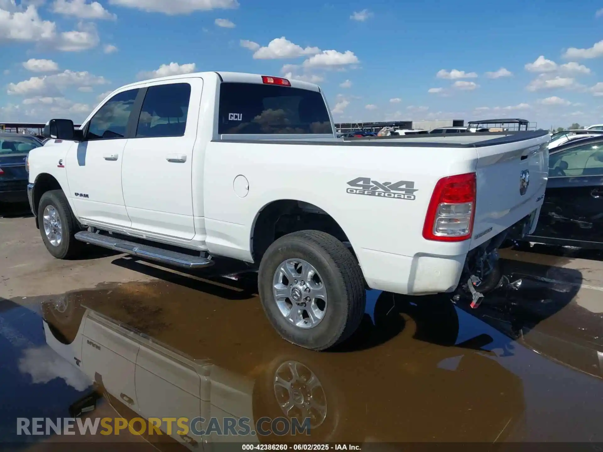 3 Photograph of a damaged car 3C6UR5DL1MG676863 RAM 2500 2021