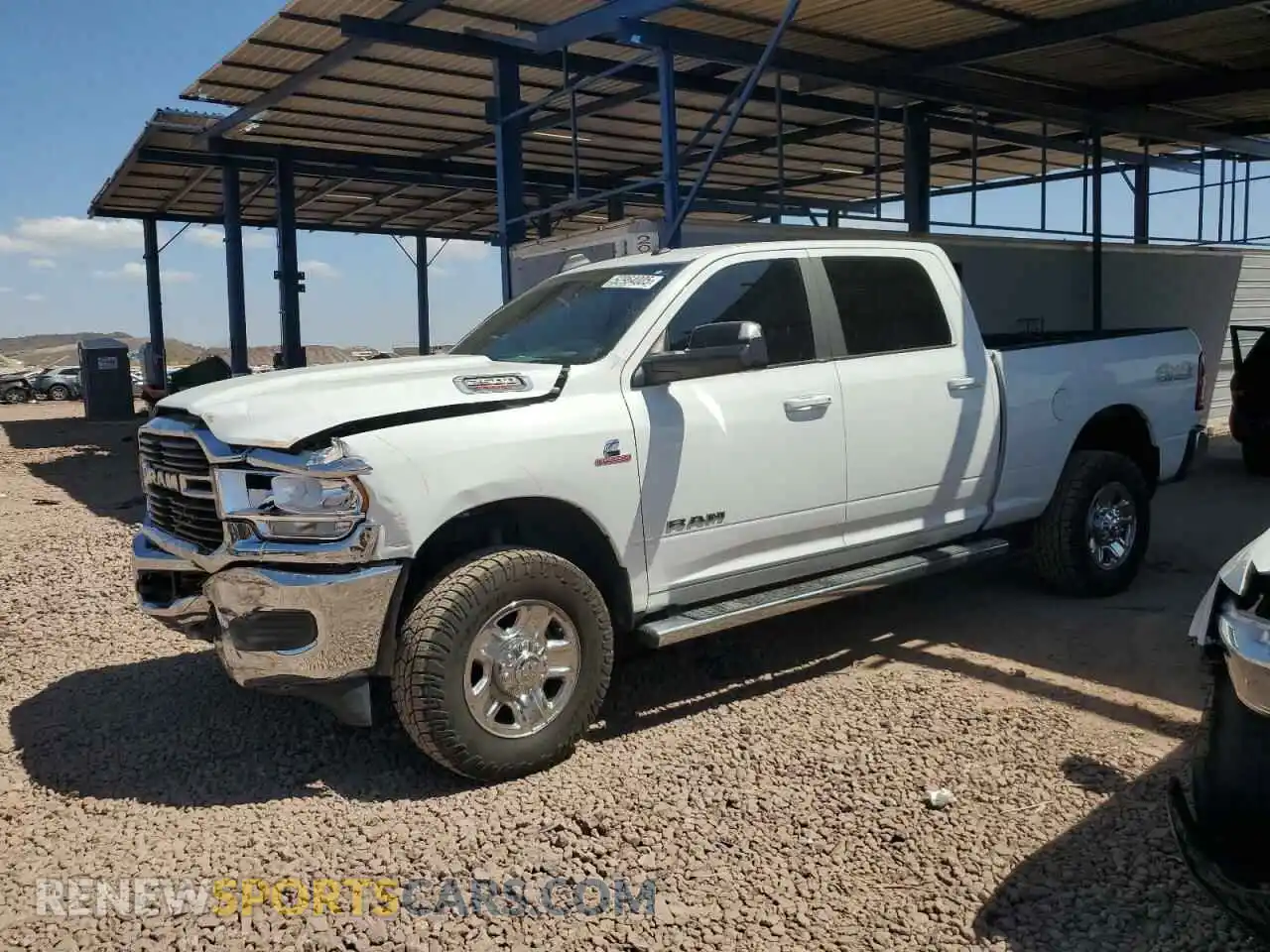 1 Photograph of a damaged car 3C6UR5DL1MG678113 RAM 2500 2021