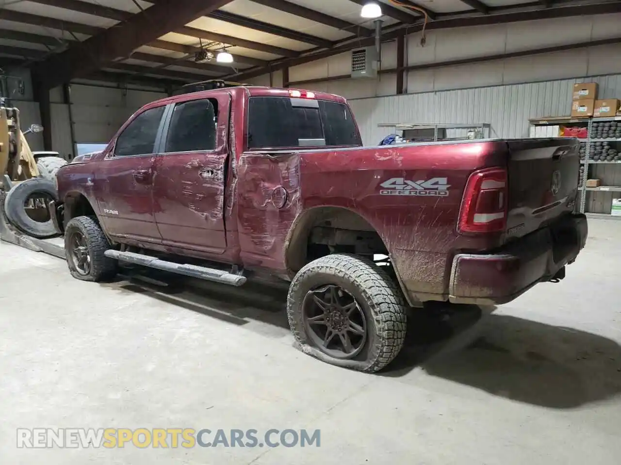 2 Photograph of a damaged car 3C6UR5DL2MG610287 RAM 2500 2021