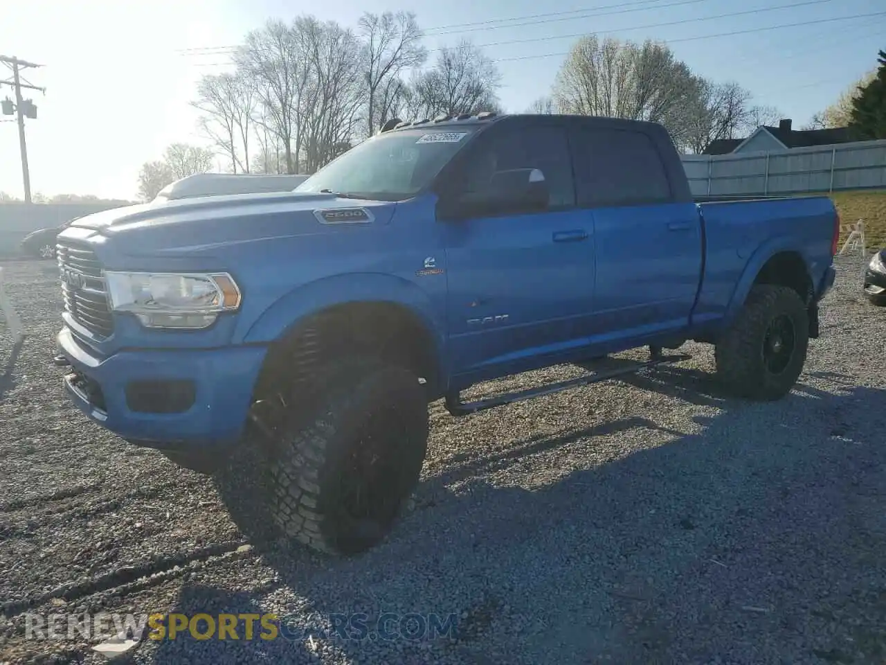 1 Photograph of a damaged car 3C6UR5DL2MG643385 RAM 2500 2021