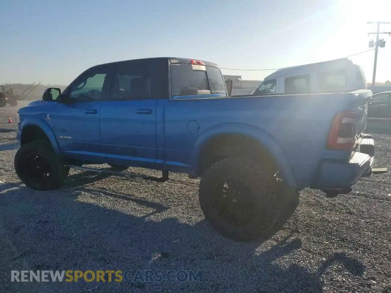 2 Photograph of a damaged car 3C6UR5DL2MG643385 RAM 2500 2021