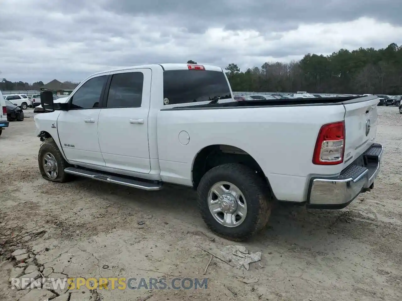 2 Photograph of a damaged car 3C6UR5DL3MG509100 RAM 2500 2021