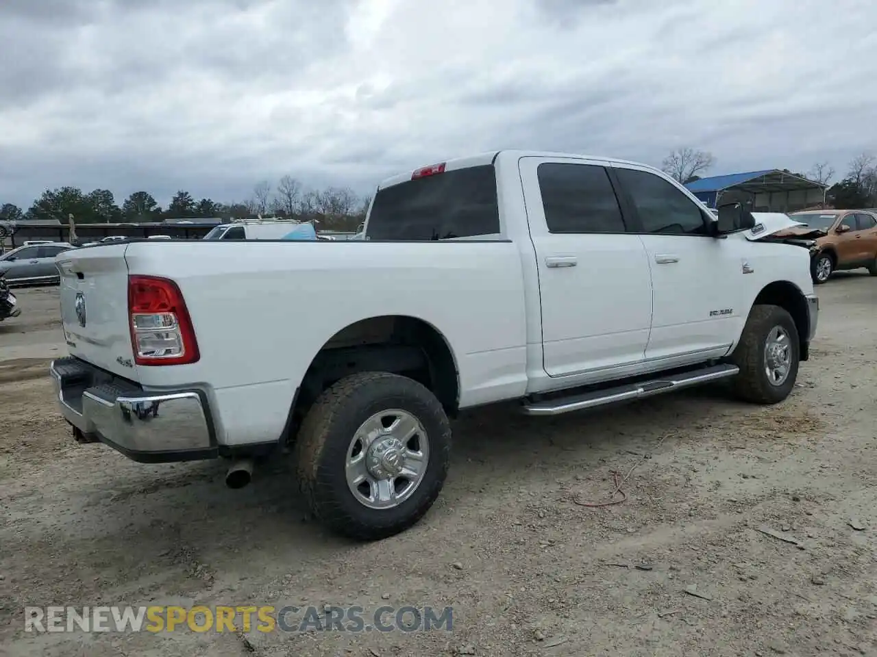 3 Photograph of a damaged car 3C6UR5DL3MG509100 RAM 2500 2021