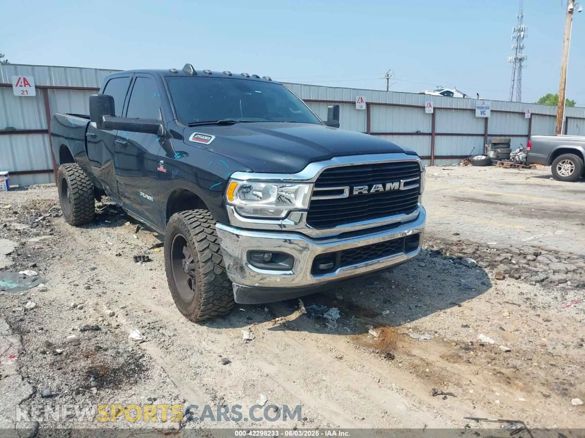 1 Photograph of a damaged car 3C6UR5DL3MG610847 RAM 2500 2021