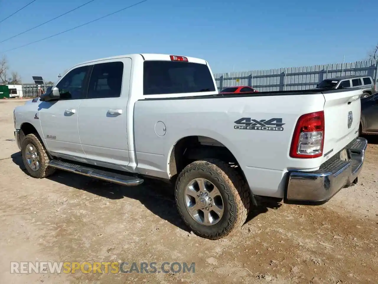 2 Photograph of a damaged car 3C6UR5DL3MG656159 RAM 2500 2021