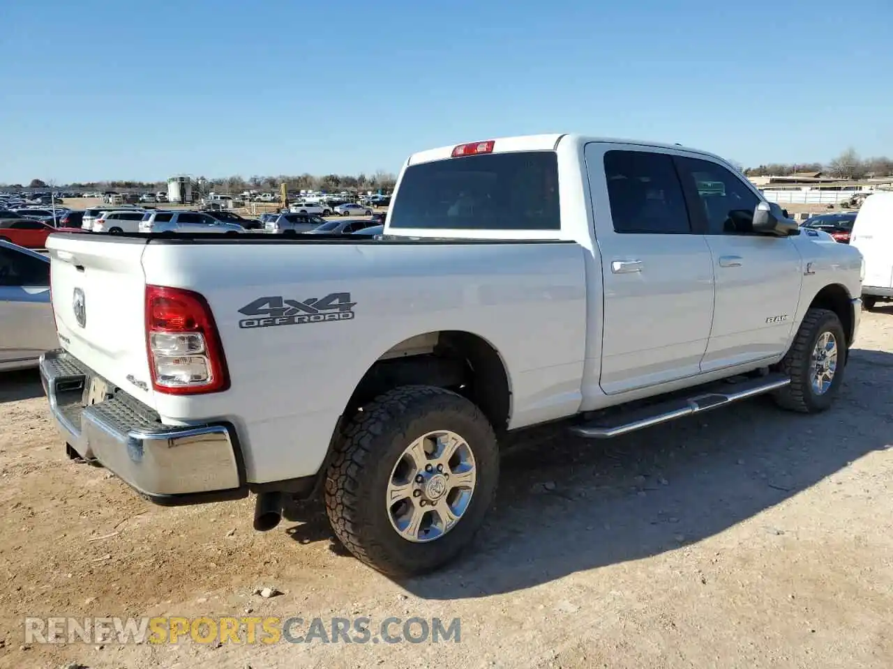 3 Photograph of a damaged car 3C6UR5DL3MG656159 RAM 2500 2021