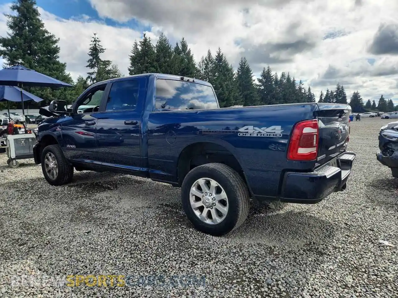 2 Photograph of a damaged car 3C6UR5DL4MG572481 RAM 2500 2021