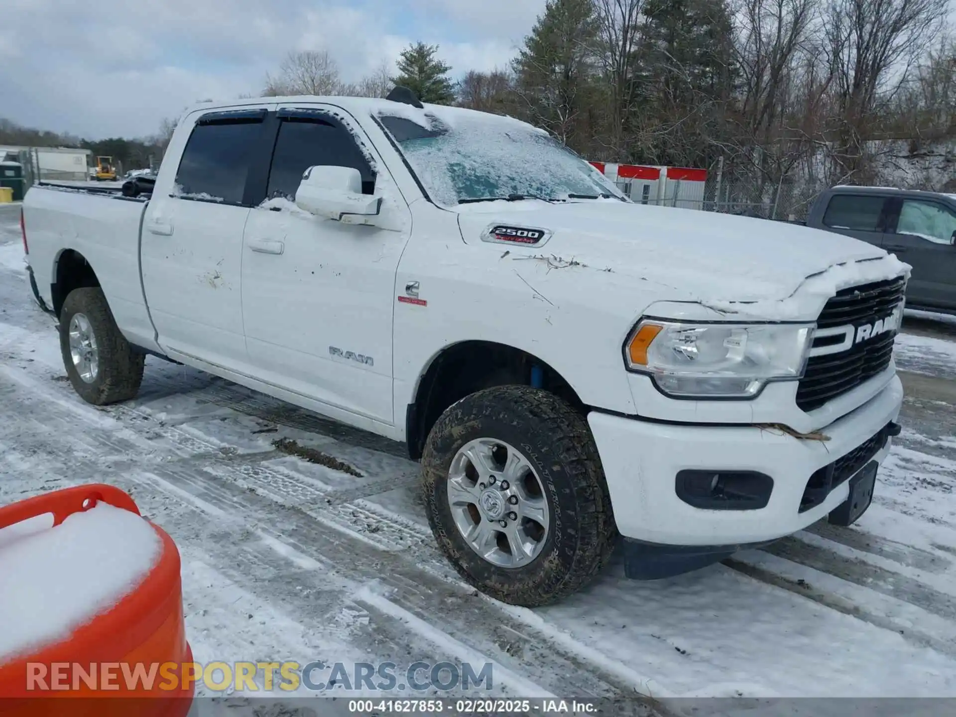 1 Photograph of a damaged car 3C6UR5DL5MG529834 RAM 2500 2021