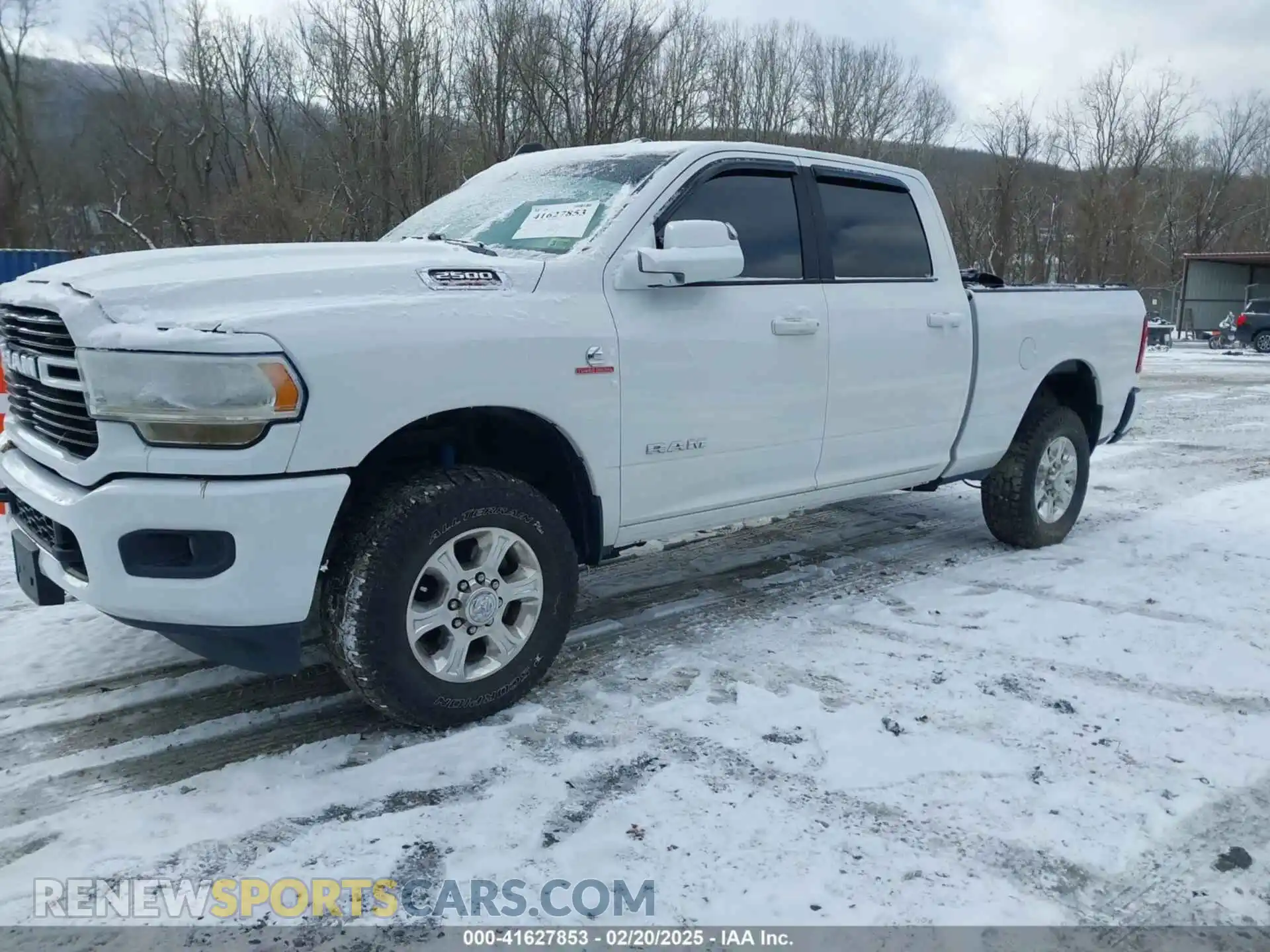 2 Photograph of a damaged car 3C6UR5DL5MG529834 RAM 2500 2021
