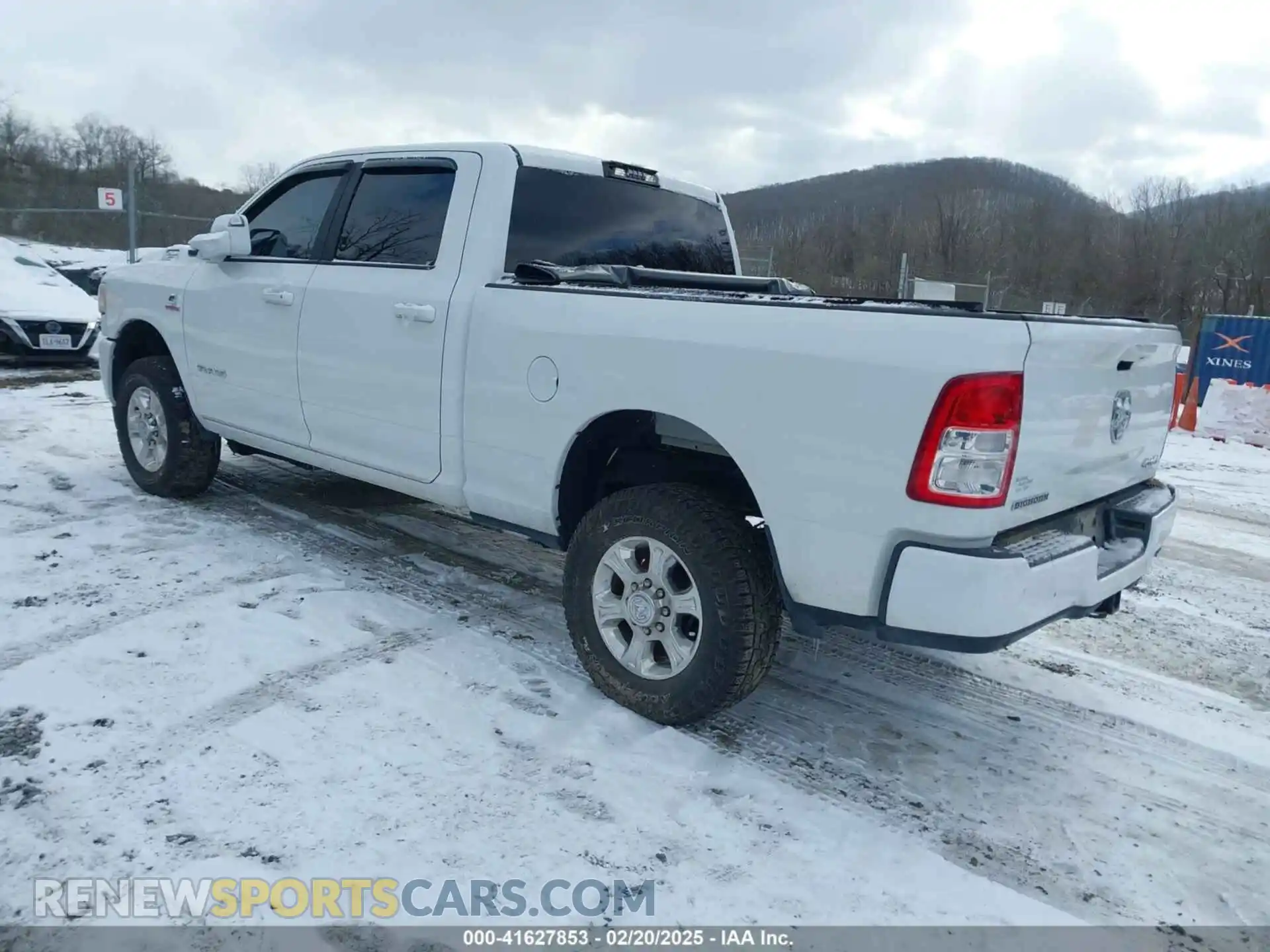 3 Photograph of a damaged car 3C6UR5DL5MG529834 RAM 2500 2021