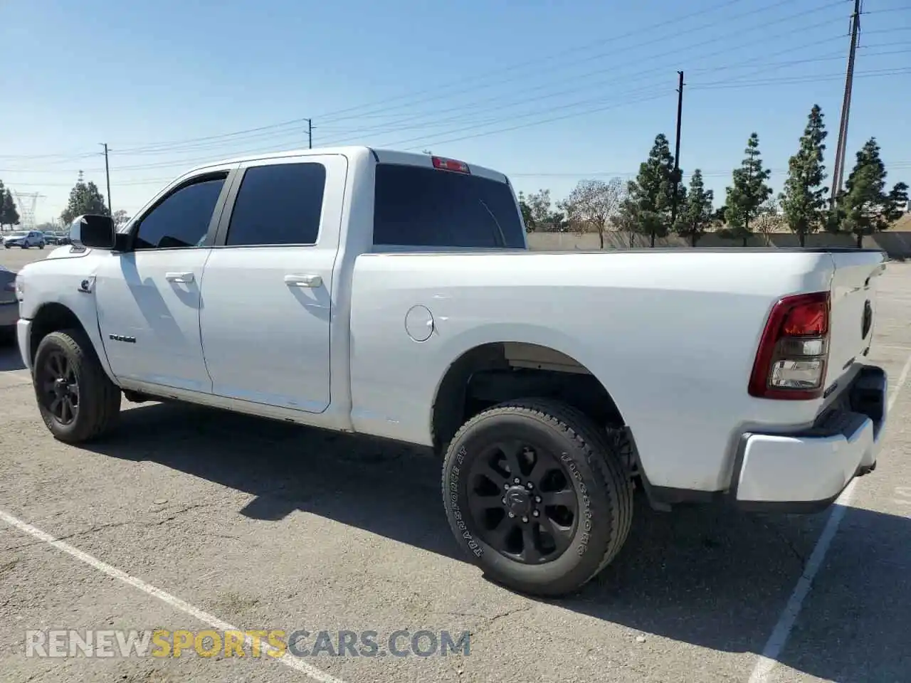 2 Photograph of a damaged car 3C6UR5DL5MG633465 RAM 2500 2021