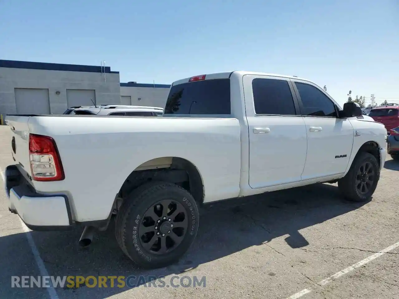 3 Photograph of a damaged car 3C6UR5DL5MG633465 RAM 2500 2021