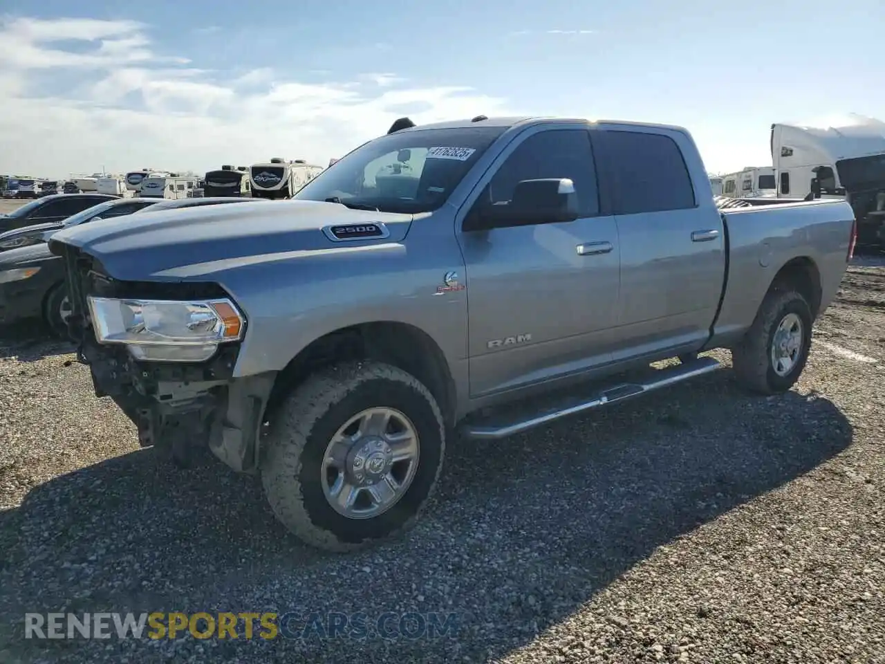 1 Photograph of a damaged car 3C6UR5DL6MG522794 RAM 2500 2021