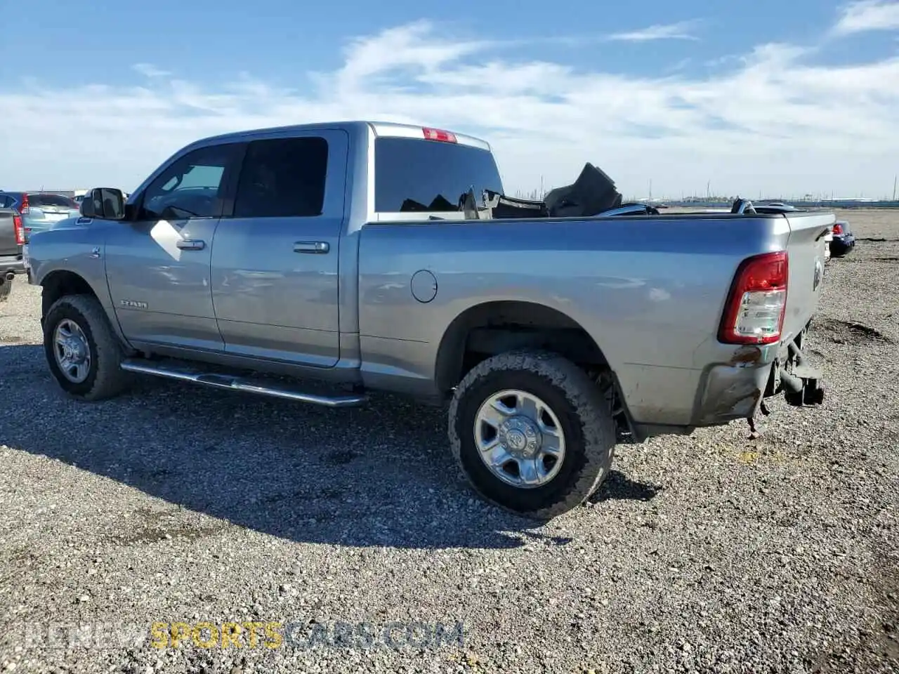 2 Photograph of a damaged car 3C6UR5DL6MG522794 RAM 2500 2021