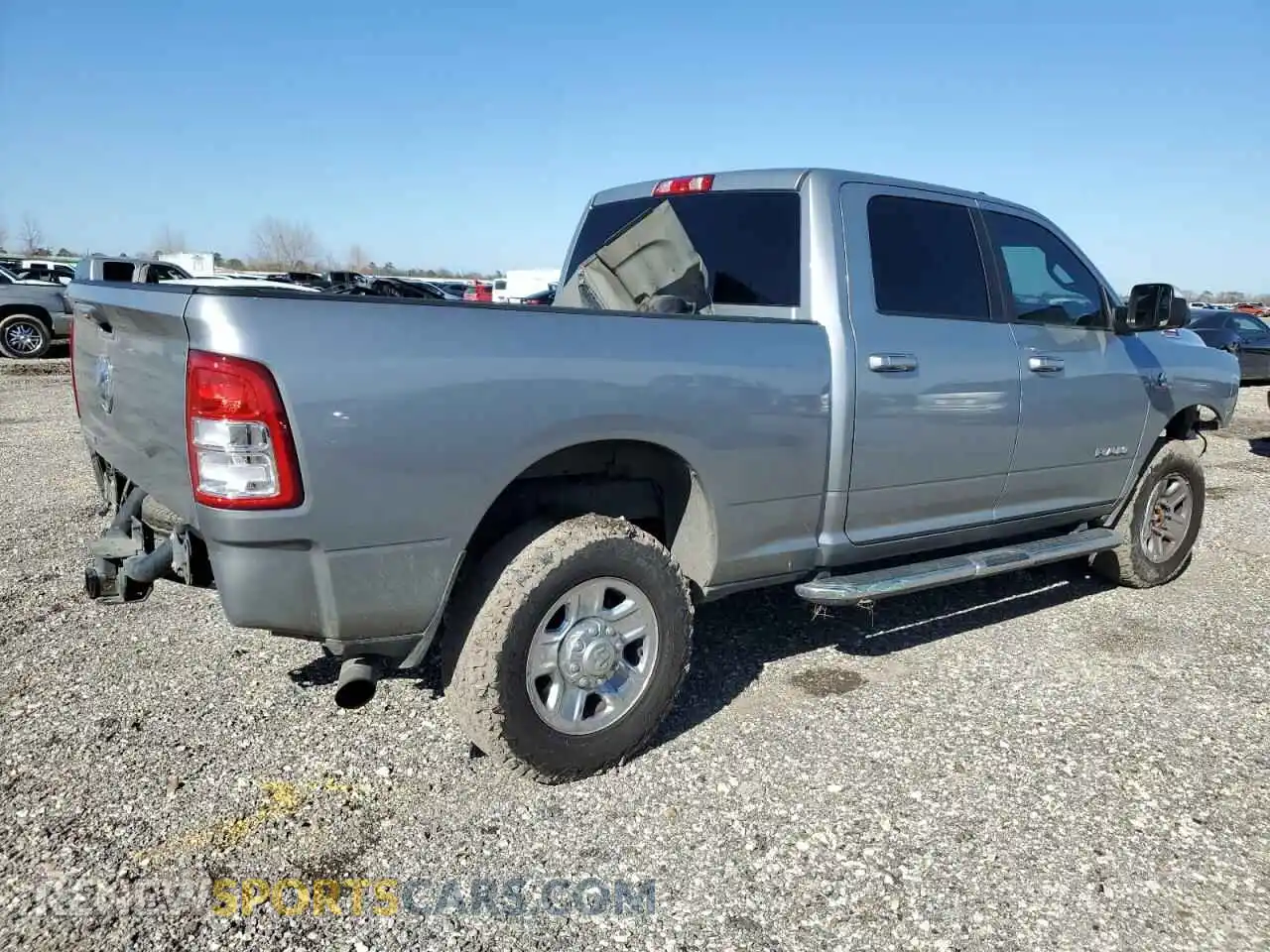 3 Photograph of a damaged car 3C6UR5DL6MG522794 RAM 2500 2021