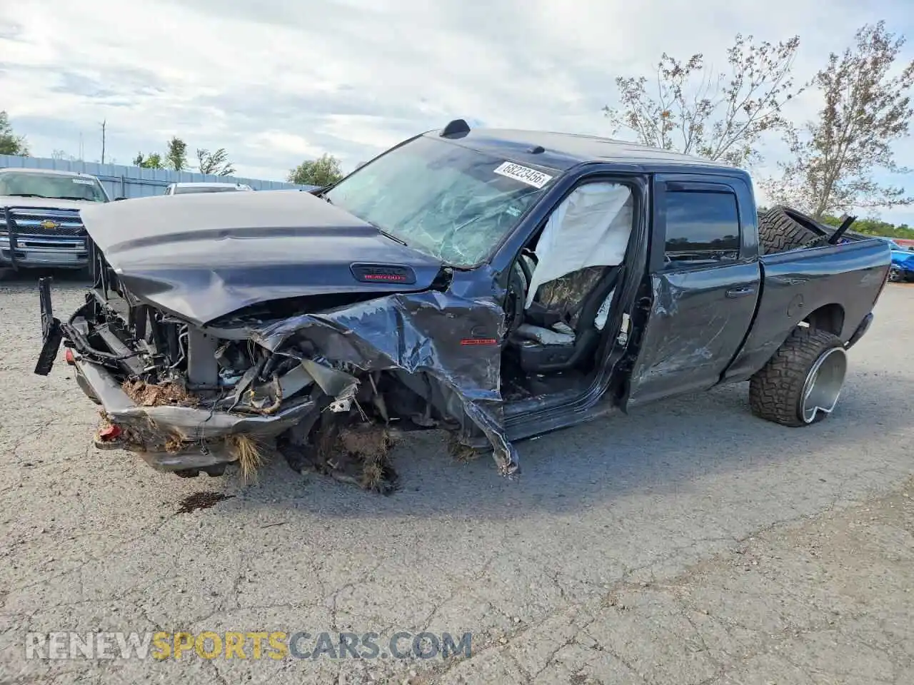 1 Photograph of a damaged car 3C6UR5DL6MG557769 RAM 2500 2021