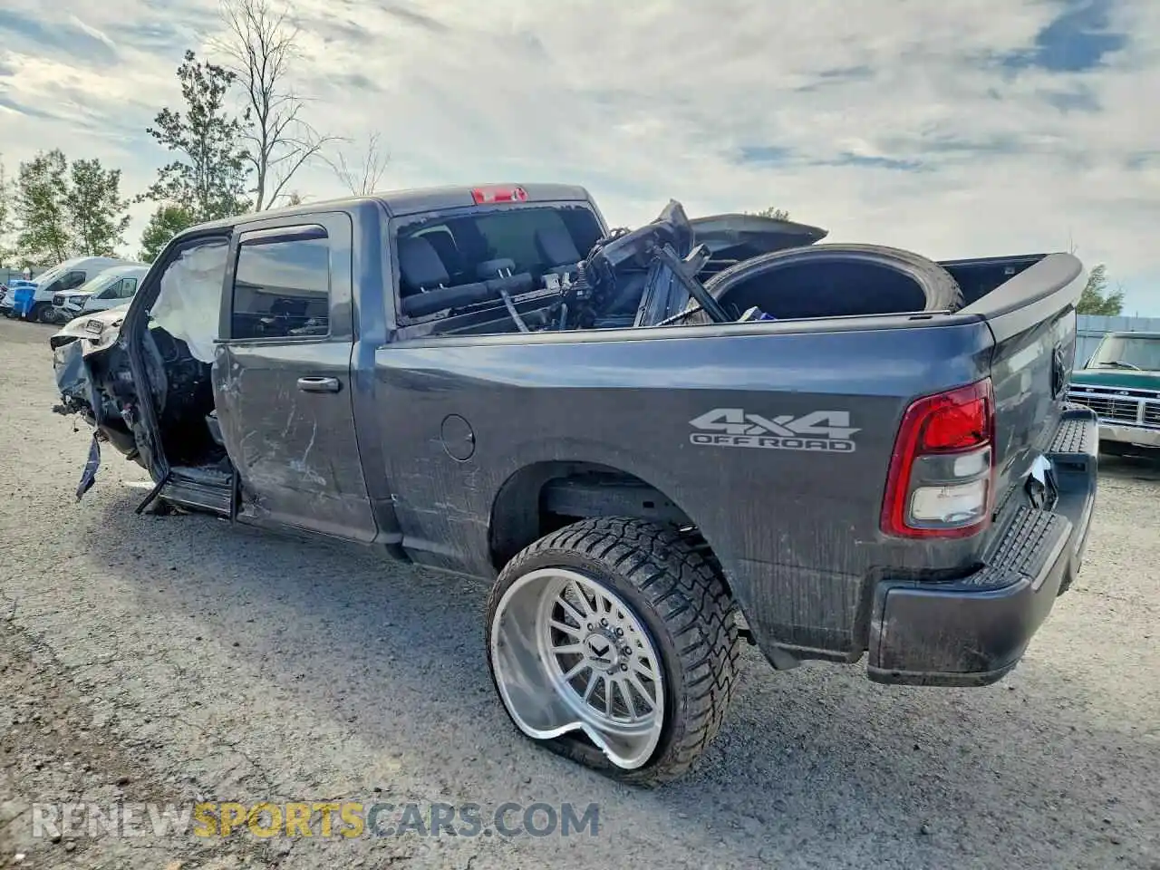 2 Photograph of a damaged car 3C6UR5DL6MG557769 RAM 2500 2021