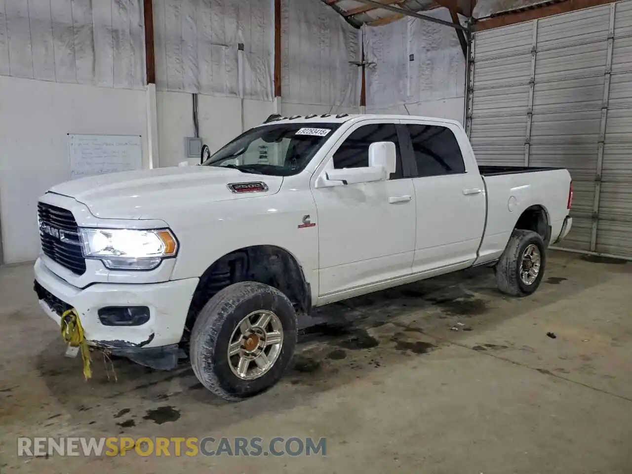1 Photograph of a damaged car 3C6UR5DL7MG679539 RAM 2500 2021