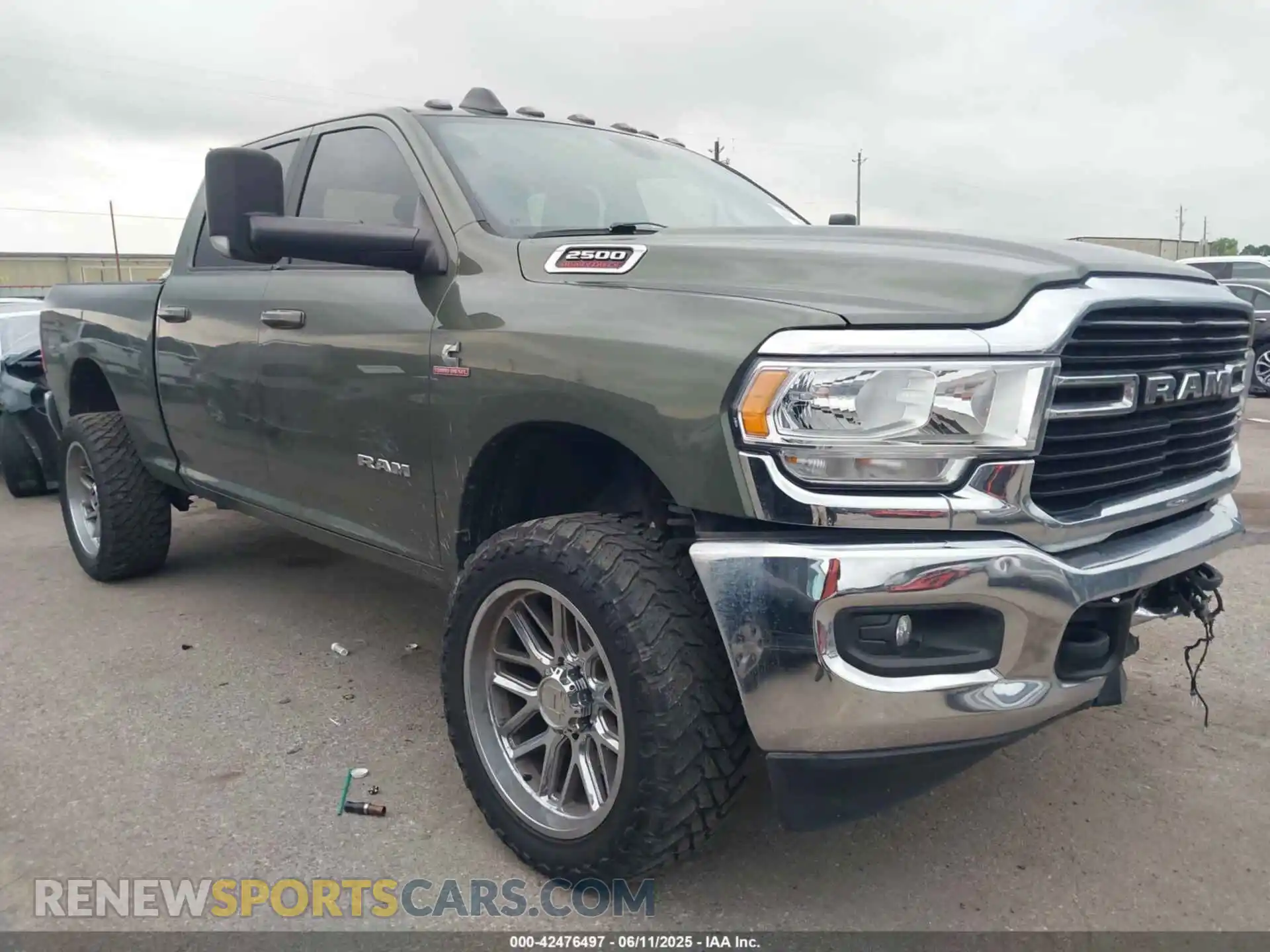 1 Photograph of a damaged car 3C6UR5DL8MG654830 RAM 2500 2021
