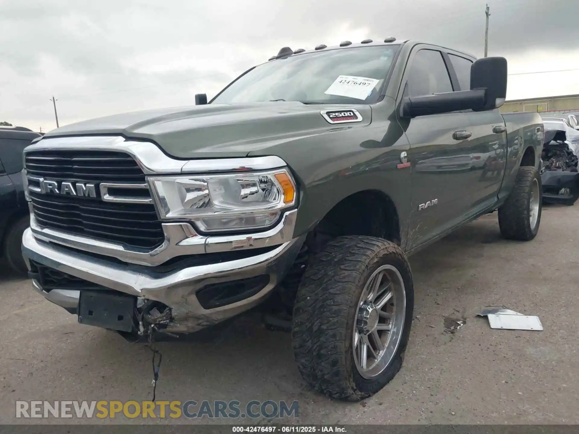2 Photograph of a damaged car 3C6UR5DL8MG654830 RAM 2500 2021