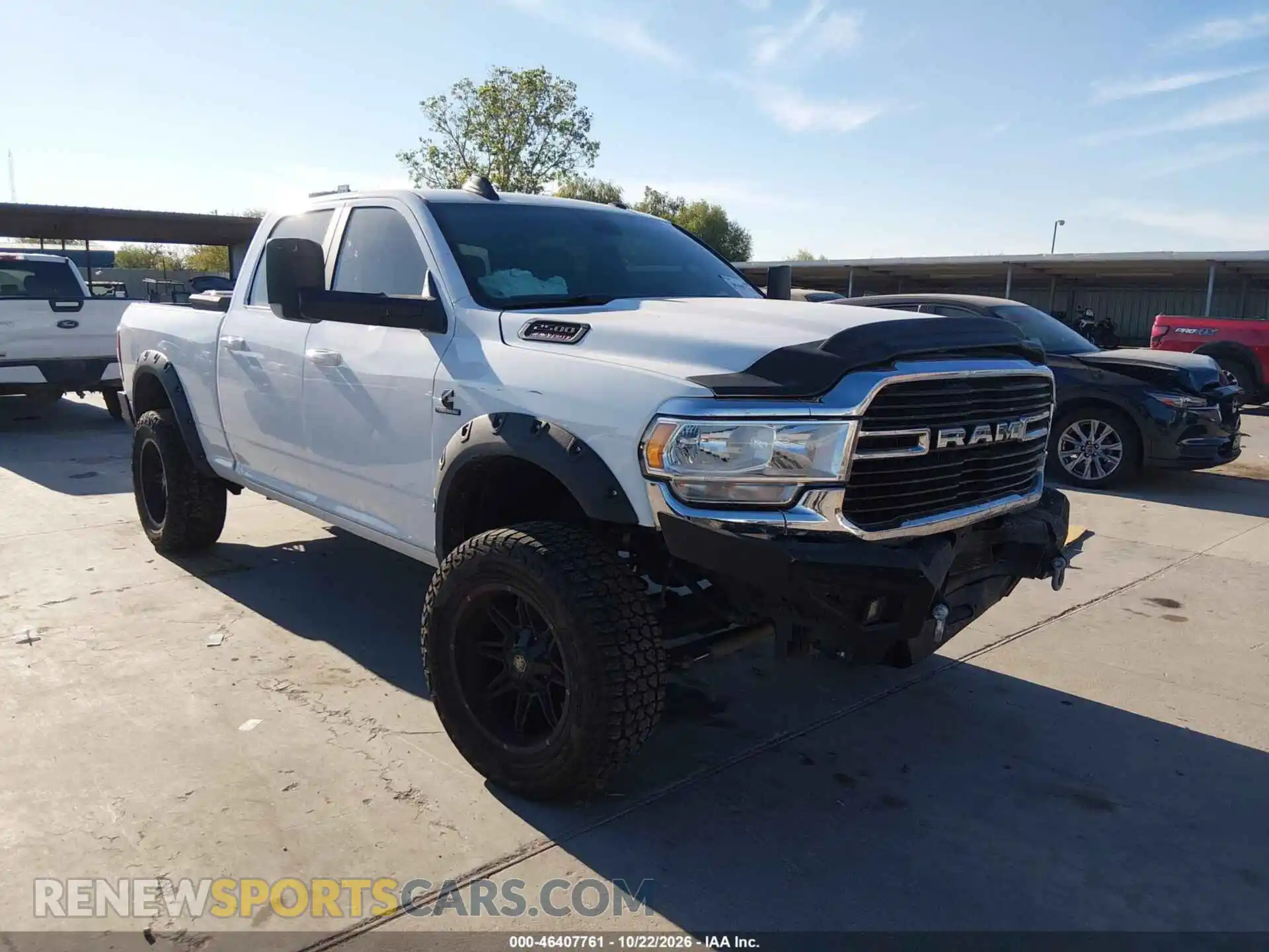 1 Photograph of a damaged car 3C6UR5DL9MG579264 RAM 2500 2021
