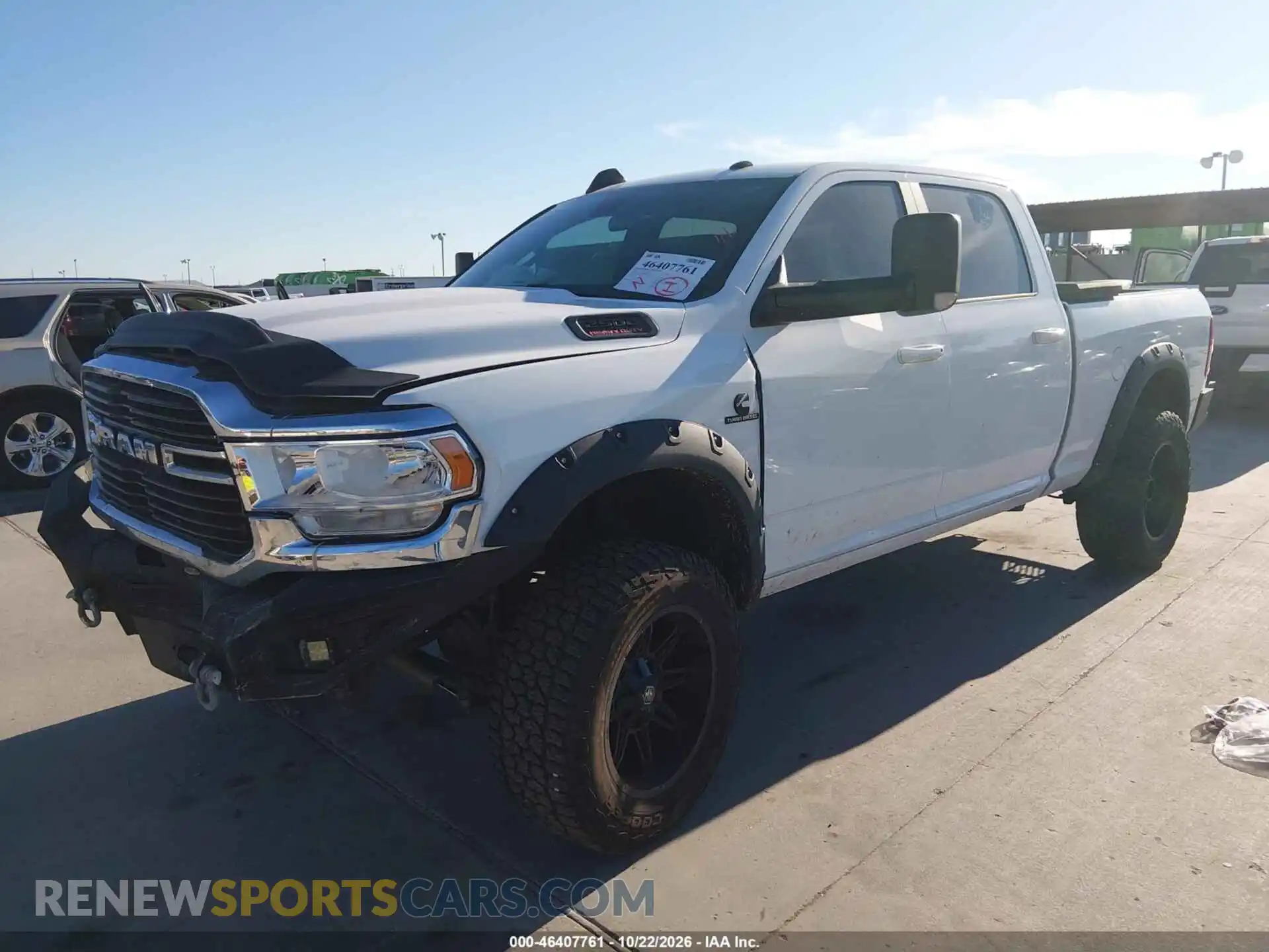 2 Photograph of a damaged car 3C6UR5DL9MG579264 RAM 2500 2021