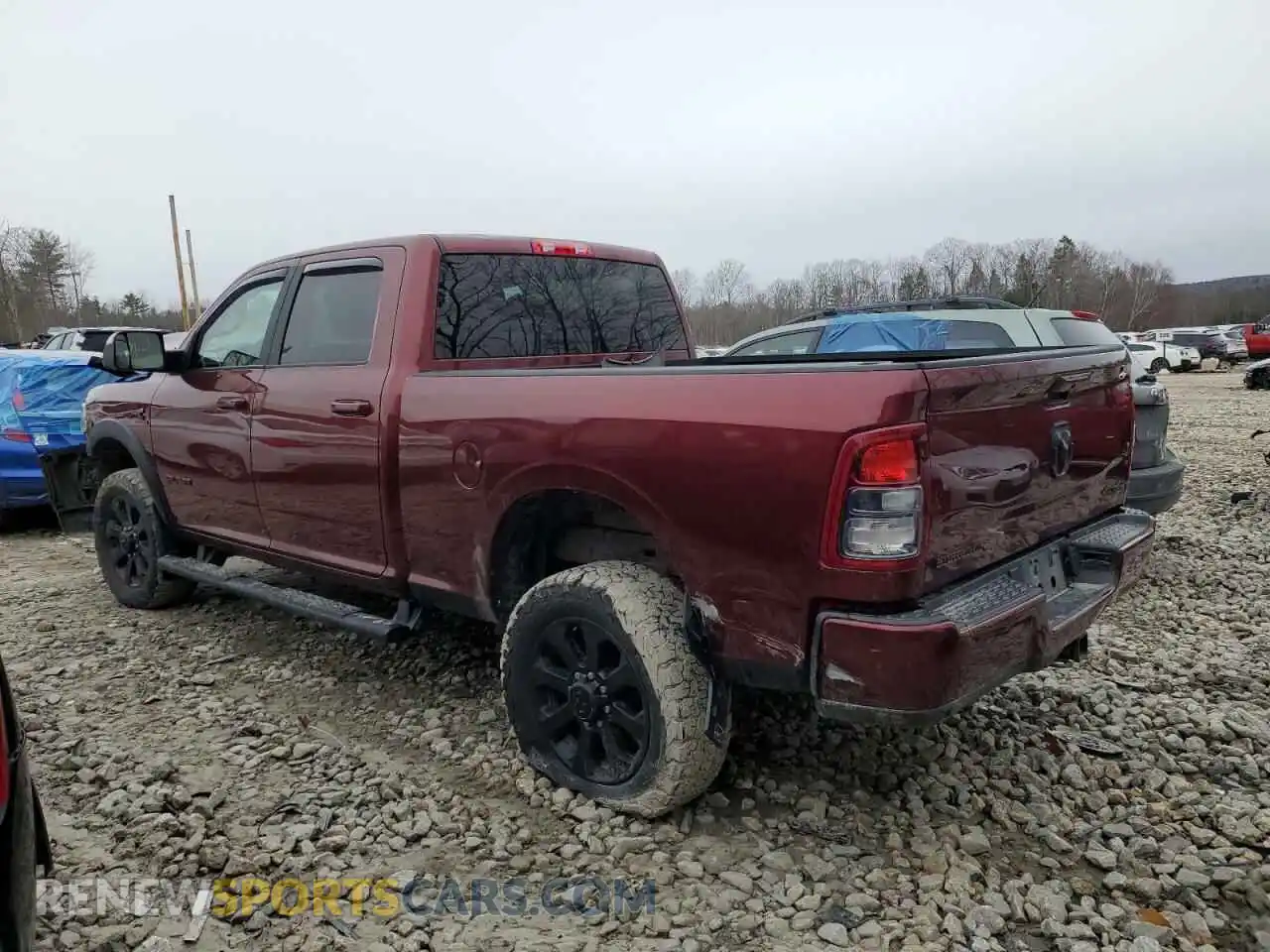 2 Photograph of a damaged car 3C6UR5DL9MG612117 RAM 2500 2021