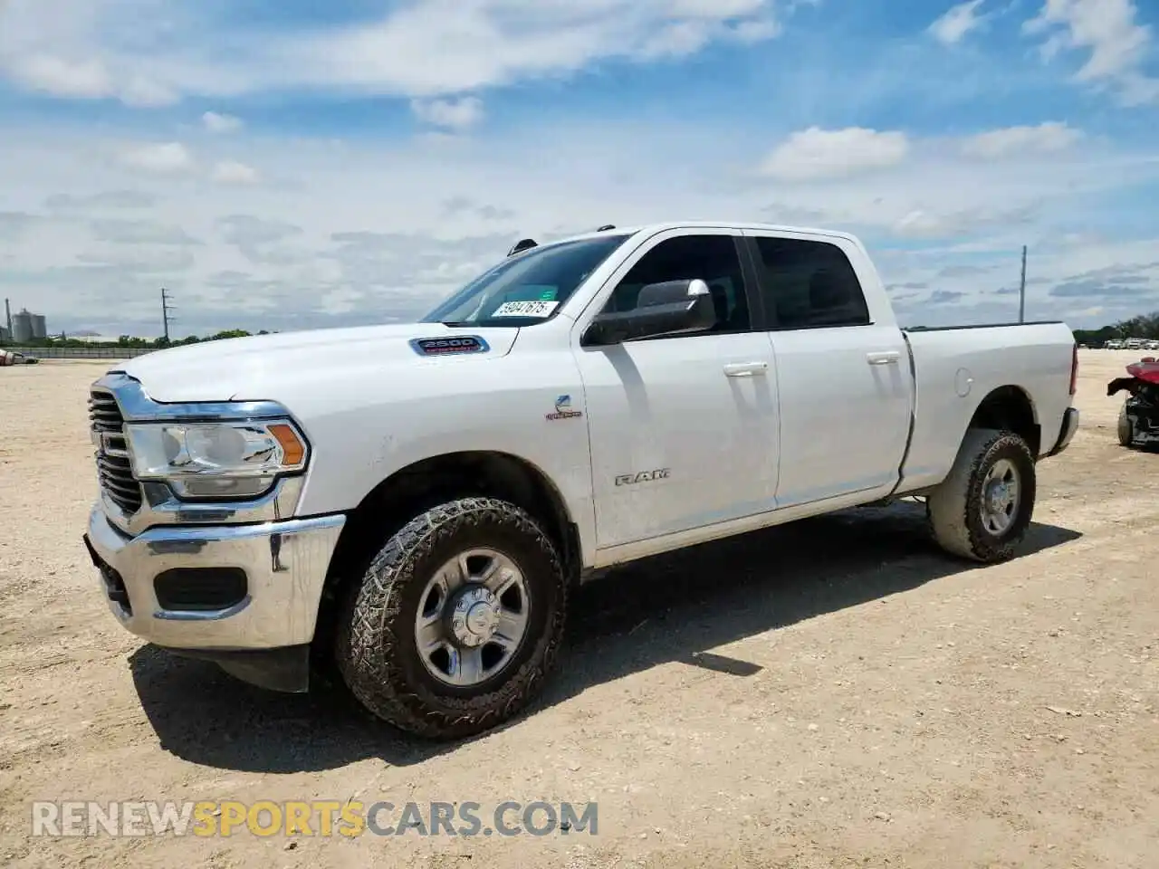1 Photograph of a damaged car 3C6UR5DL9MG628060 RAM 2500 2021