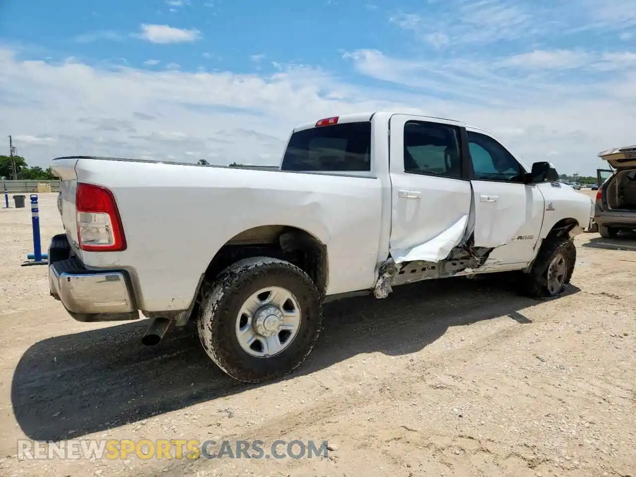 3 Photograph of a damaged car 3C6UR5DL9MG628060 RAM 2500 2021