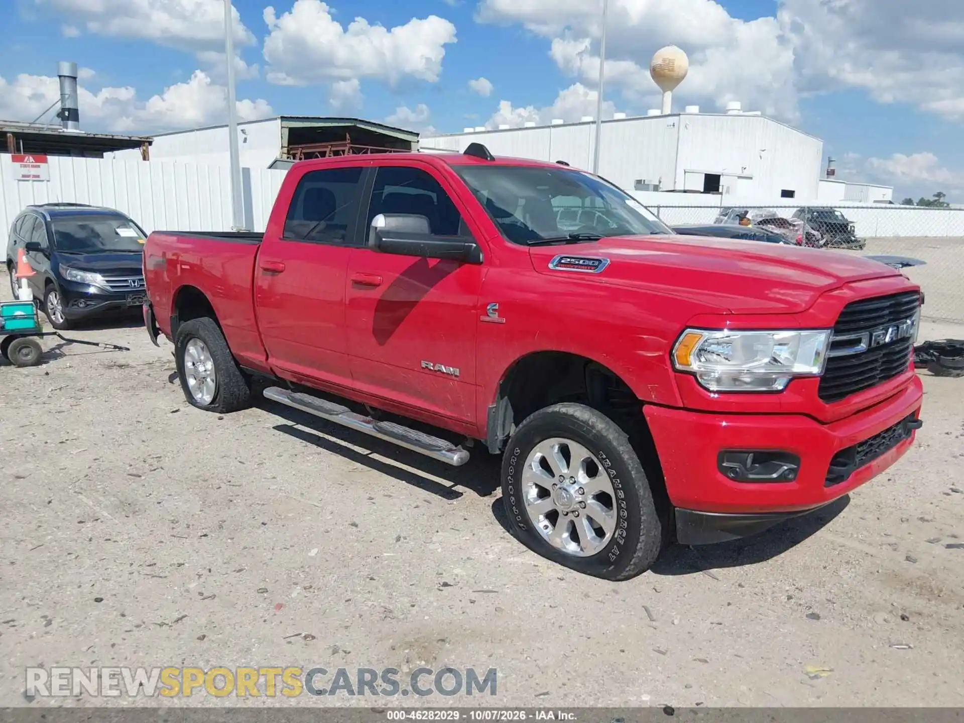 1 Photograph of a damaged car 3C6UR5DL9MG648471 RAM 2500 2021