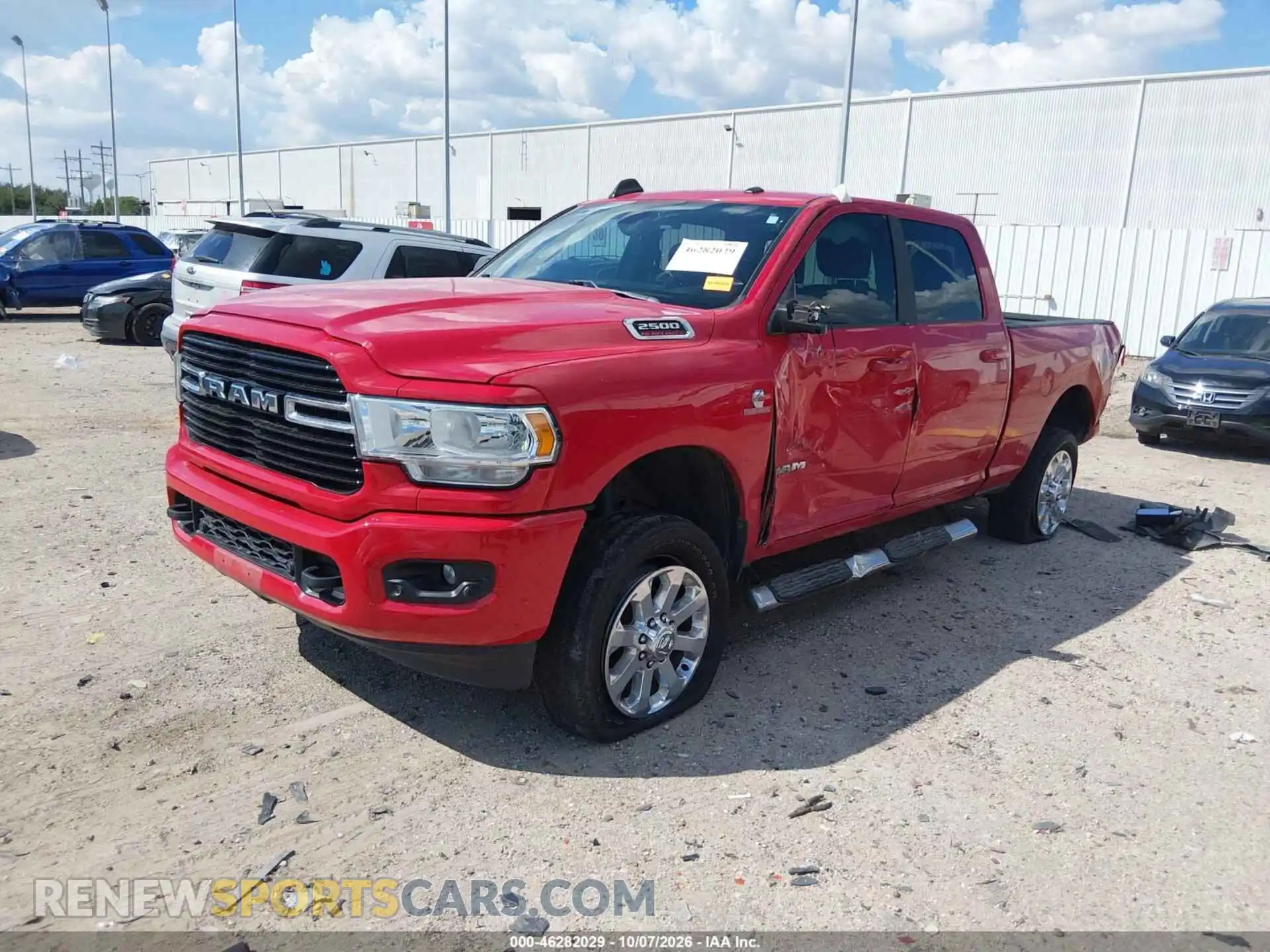 2 Photograph of a damaged car 3C6UR5DL9MG648471 RAM 2500 2021