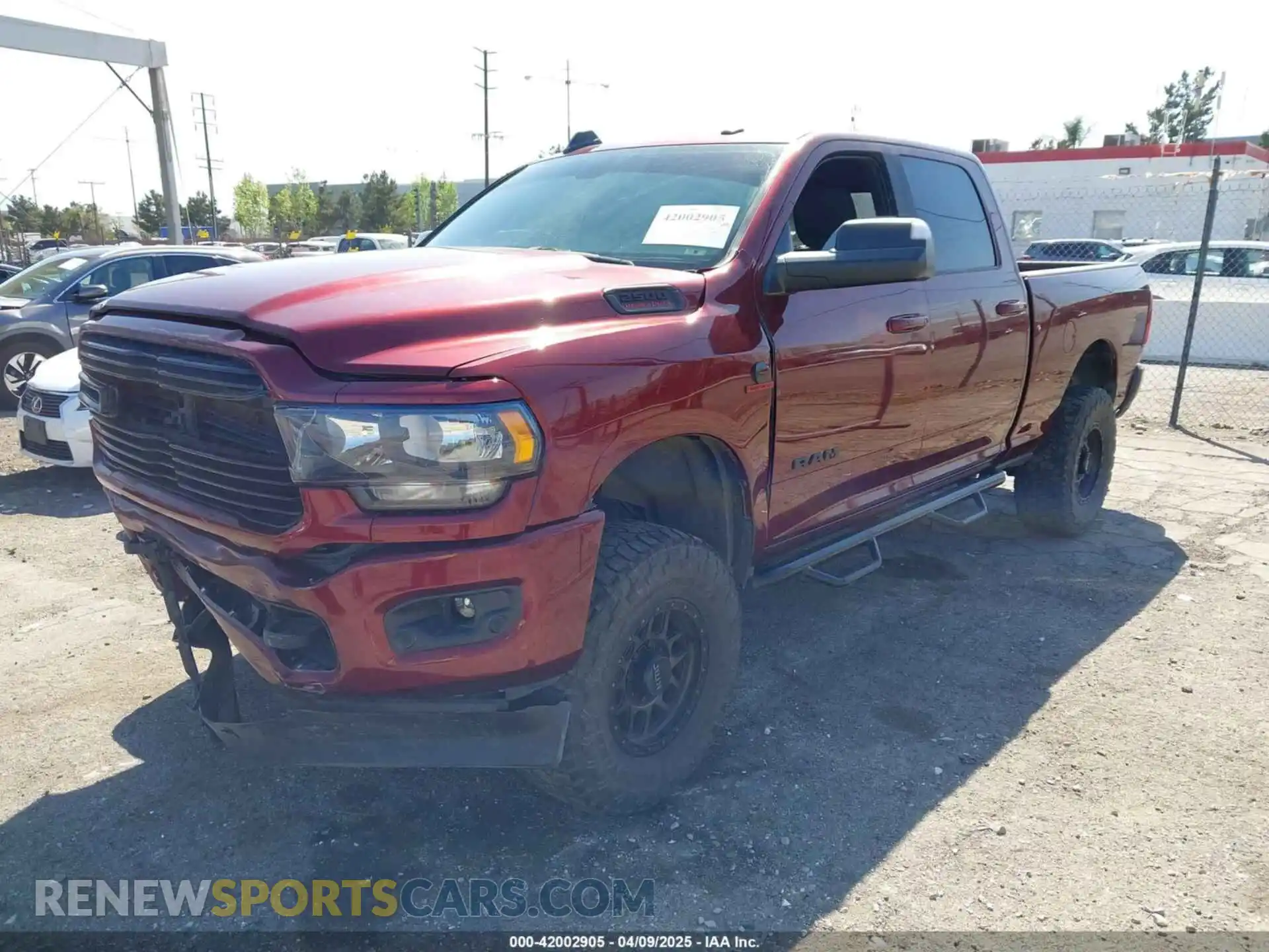 2 Photograph of a damaged car 3C6UR5DLXMG501964 RAM 2500 2021