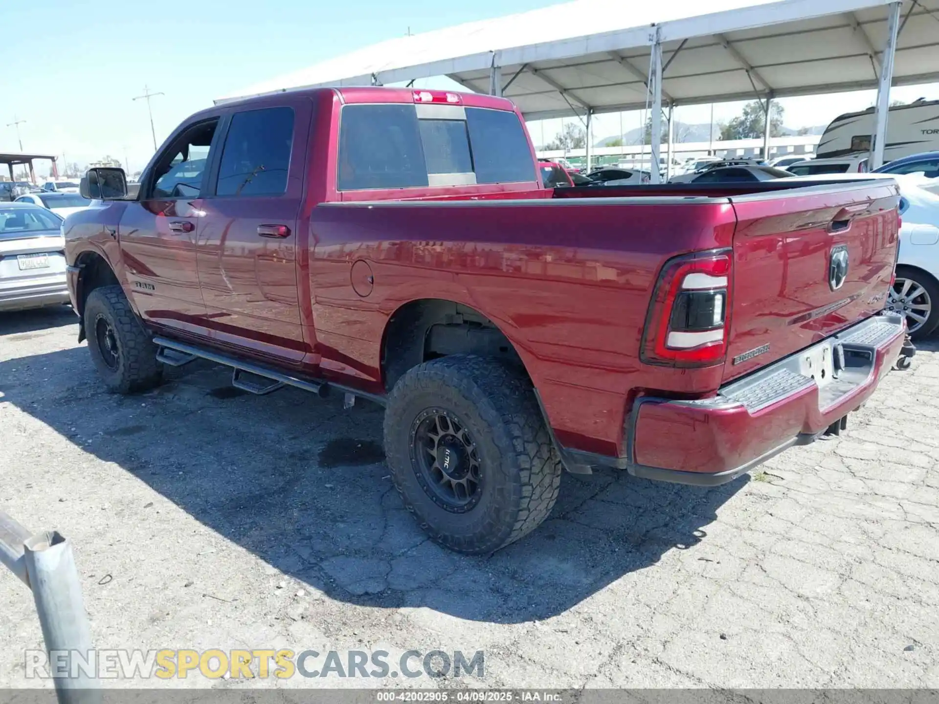 3 Photograph of a damaged car 3C6UR5DLXMG501964 RAM 2500 2021